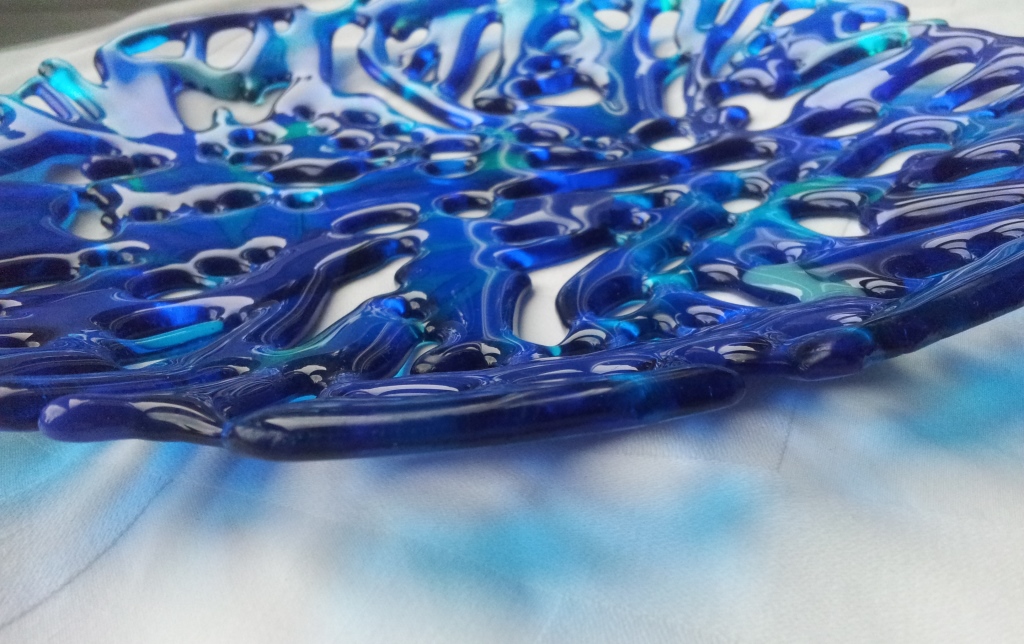 Blue shallow holey bowly